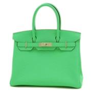 Pre-owned Fabric handbags Hermès Vintage , Green , Dames