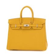 Pre-owned Fabric handbags Hermès Vintage , Yellow , Dames