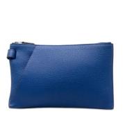 Pre-owned Fabric clutches Hermès Vintage , Blue , Dames