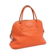 Pre-owned Fabric handbags Hermès Vintage , Orange , Dames