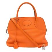 Pre-owned Fabric handbags Hermès Vintage , Orange , Dames