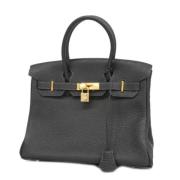 Pre-owned Fabric handbags Hermès Vintage , Black , Dames