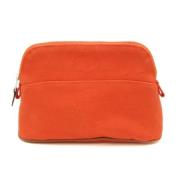 Pre-owned Cotton pouches Hermès Vintage , Orange , Dames