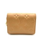 Pre-owned Leather wallets Louis Vuitton Vintage , Beige , Dames