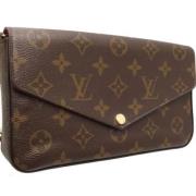 Pre-owned Canvas wallets Louis Vuitton Vintage , Brown , Dames