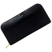 Pre-owned Leather wallets Yves Saint Laurent Vintage , Black , Dames