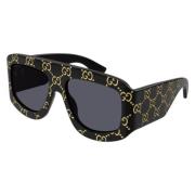 Stijlvolle zonnebril in zwart Gucci , Black , Unisex