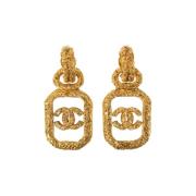 Pre-owned Metal earrings Chanel Vintage , Yellow , Dames