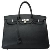 Pre-owned Leather handbags Hermès Vintage , Black , Dames