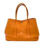 Pre-owned Leather handbags Hermès Vintage , Orange , Dames