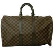 Pre-owned Fabric handbags Louis Vuitton Vintage , Brown , Dames