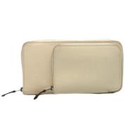 Pre-owned Canvas wallets Hermès Vintage , Beige , Dames