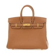 Pre-owned Leather handbags Hermès Vintage , Brown , Dames