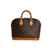 Pre-owned Canvas handbags Louis Vuitton Vintage , Brown , Dames