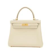 Pre-owned Leather handbags Hermès Vintage , Beige , Dames