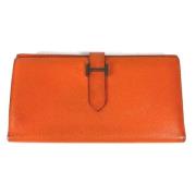 Pre-owned Leather wallets Hermès Vintage , Orange , Dames