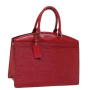 Pre-owned Leather handbags Louis Vuitton Vintage , Red , Dames