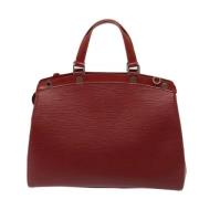 Pre-owned Leather handbags Louis Vuitton Vintage , Red , Dames