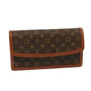 Pre-owned Canvas clutches Louis Vuitton Vintage , Brown , Dames