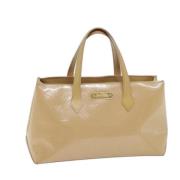 Pre-owned Leather handbags Louis Vuitton Vintage , Beige , Dames