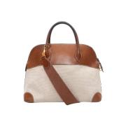 Pre-owned Leather handbags Hermès Vintage , Beige , Dames