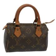 Pre-owned Canvas handbags Louis Vuitton Vintage , Brown , Dames