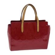 Pre-owned Leather handbags Louis Vuitton Vintage , Red , Dames