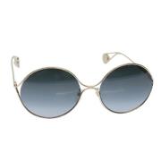 Pre-owned Metal sunglasses Gucci Vintage , Yellow , Dames