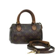 Pre-owned Canvas handbags Louis Vuitton Vintage , Brown , Dames