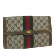 Pre-owned Canvas clutches Gucci Vintage , Beige , Dames