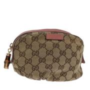 Pre-owned Canvas pouches Gucci Vintage , Beige , Dames