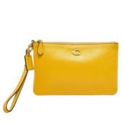 Pre-owned Leather clutches Coach Pre-owned , Yellow , Dames