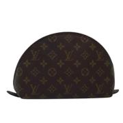 Pre-owned Canvas pouches Louis Vuitton Vintage , Brown , Dames