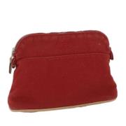 Pre-owned Canvas pouches Hermès Vintage , Red , Dames