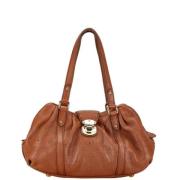 Pre-owned Fabric handbags Louis Vuitton Vintage , Brown , Dames