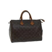 Pre-owned Canvas handbags Louis Vuitton Vintage , Brown , Dames