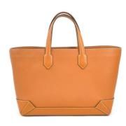 Pre-owned Leather handbags Hermès Vintage , Orange , Dames