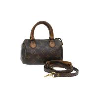 Pre-owned Canvas handbags Louis Vuitton Vintage , Brown , Dames