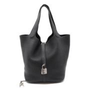 Pre-owned Leather handbags Hermès Vintage , Black , Dames