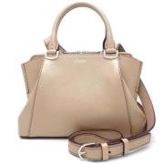 Pre-owned Leather shoulder-bags Cartier Vintage , Beige , Dames