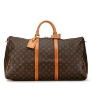 Pre-owned Canvas travel-bags Louis Vuitton Vintage , Brown , Dames