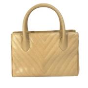 Pre-owned Leather chanel-bags Chanel Vintage , Beige , Dames