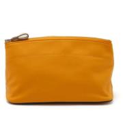 Pre-owned Leather pouches Hermès Vintage , Orange , Dames