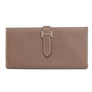 Pre-owned Leather wallets Hermès Vintage , Beige , Dames