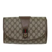 Pre-owned Canvas clutches Gucci Vintage , Beige , Dames