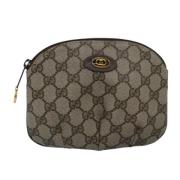 Pre-owned Canvas clutches Gucci Vintage , Beige , Dames