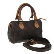 Pre-owned Canvas handbags Louis Vuitton Vintage , Brown , Dames