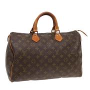 Pre-owned Canvas handbags Louis Vuitton Vintage , Brown , Dames