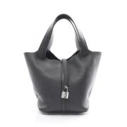 Pre-owned Leather handbags Hermès Vintage , Black , Dames