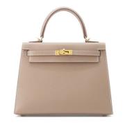 Pre-owned Leather handbags Hermès Vintage , Beige , Dames